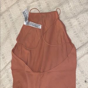 strappy pink bodysuit